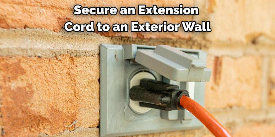 Secure an Extension Cord to an Exterior Wall