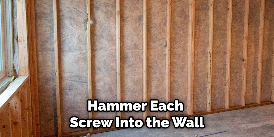 Hammer Each Screw Into the Wall