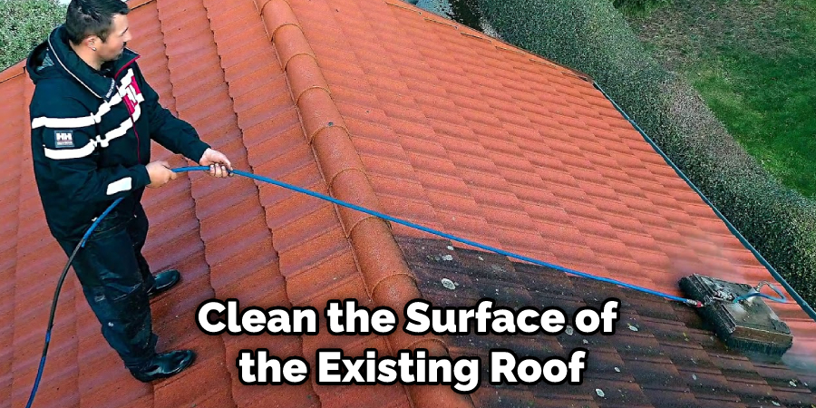 Clean the Surface of the Existing Roof