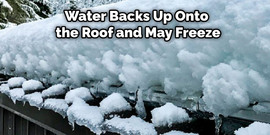 Water Backs Up Onto the Roof and May Freeze