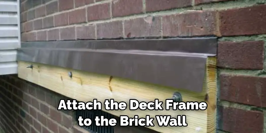 Attach the deck frame to the brick wall