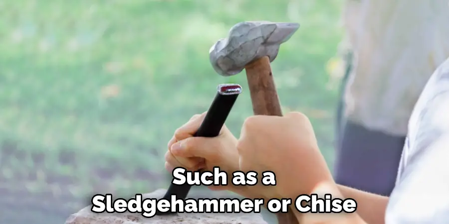 Traditional Tools Such as a Sledgehammer or Chise