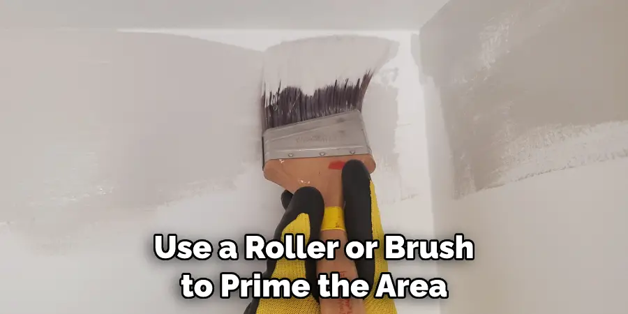 Use a Roller or Brush to Prime the Area