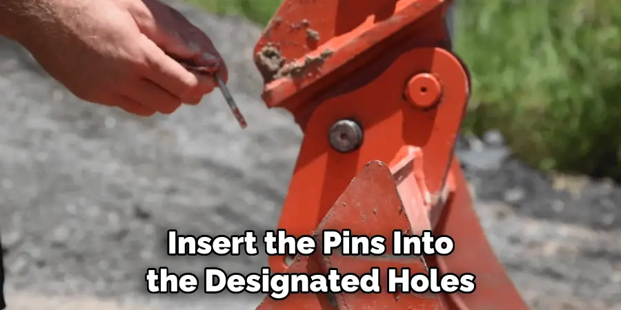 Insert the Pins Into the Designated Holes
