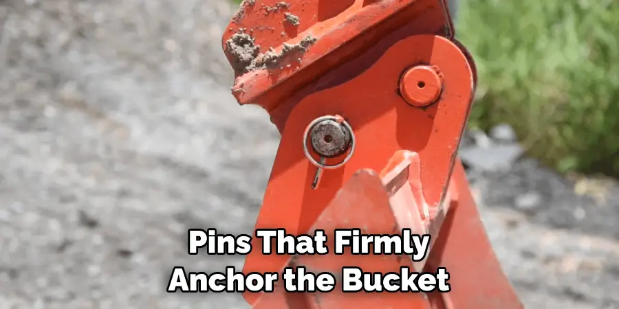 Pins That Firmly Anchor the Bucket
