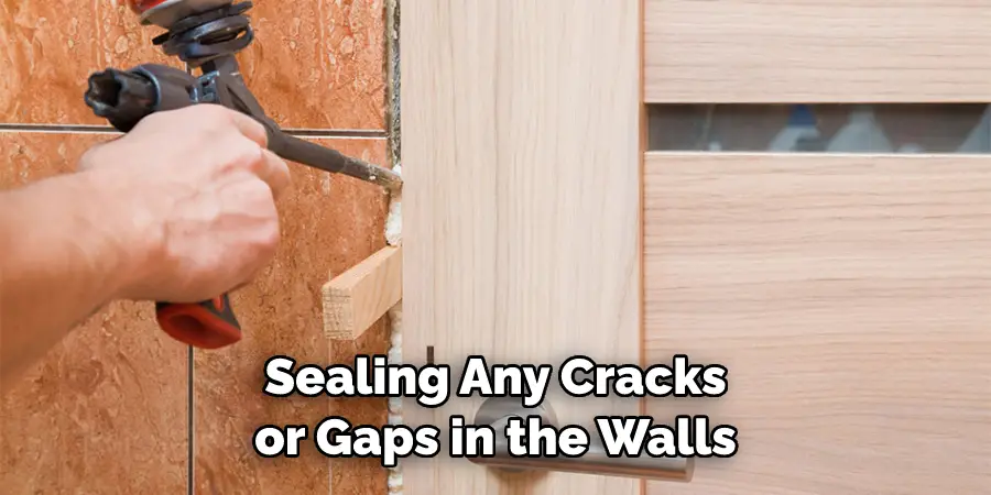 Sealing Any Cracks or Gaps in the Walls