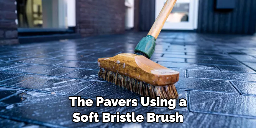 The Pavers Using a Soft Bristle Brush