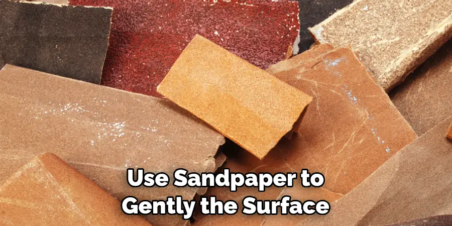 Use Sandpaper to Gently the Surface