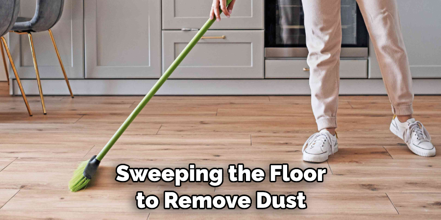 Sweeping the Floor to Remove Dust