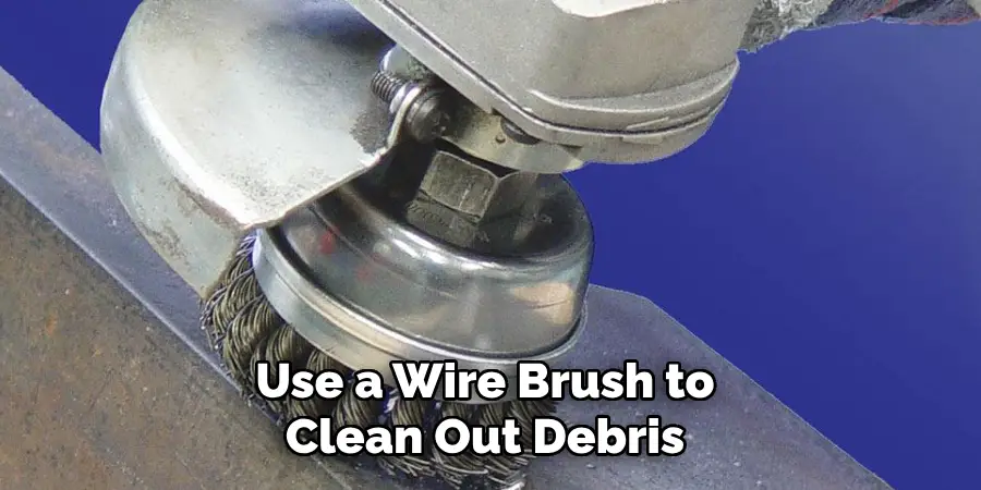 Use a Wire Brush to Clean Out Debris 