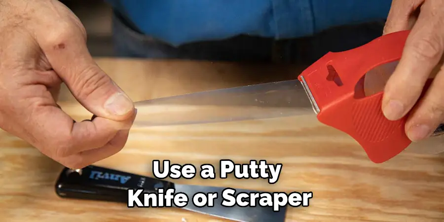 Use a Putty Knife or Scraper