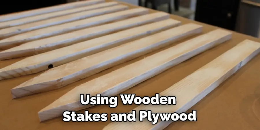 Using Wooden Stakes and Plywood