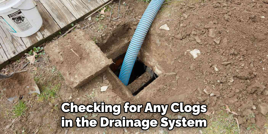 Checking for Any Clogs in the Drainage System