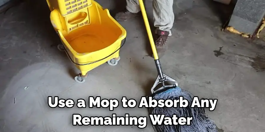 Use a Mop to Absorb Any Remaining Water