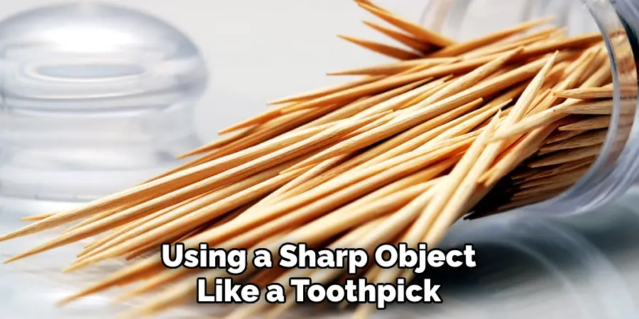 Using a Sharp Object Like a Toothpick