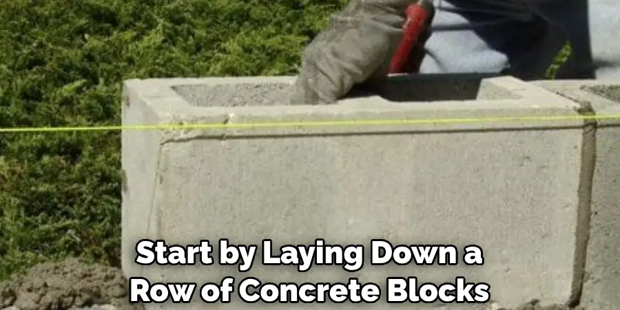 Start by Laying Down a Row of Concrete Blocks