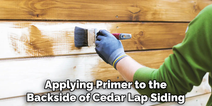 Applying Primer to the Backside of Cedar Lap Siding