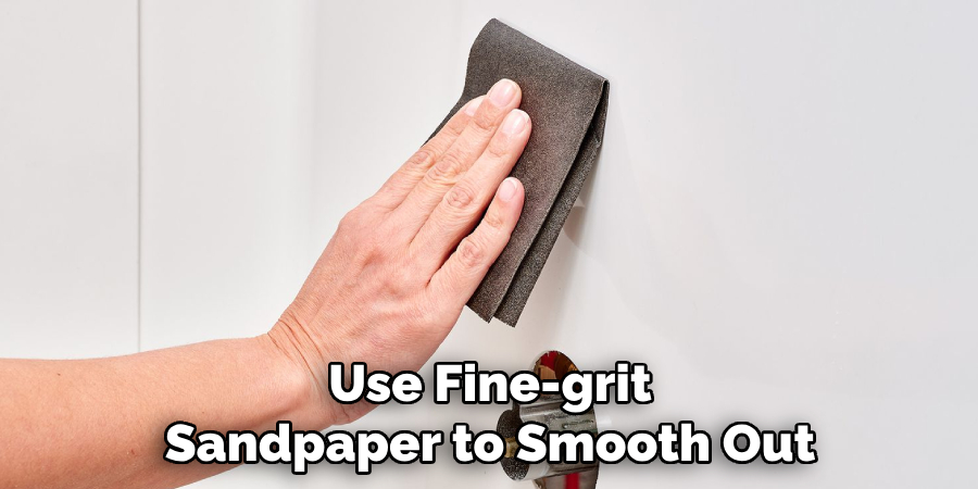 Use Fine-grit Sandpaper to Smooth Out