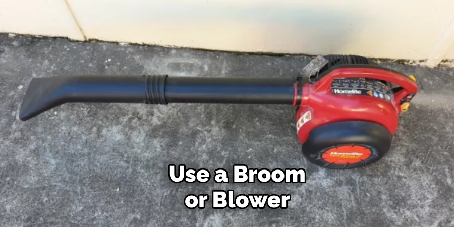 Use a Broom or Blower