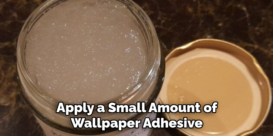 Apply a Small Amount of Wallpaper Adhesive