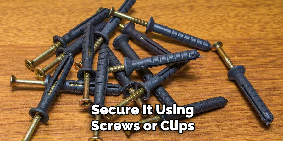 Secure It Using Screws or Clips