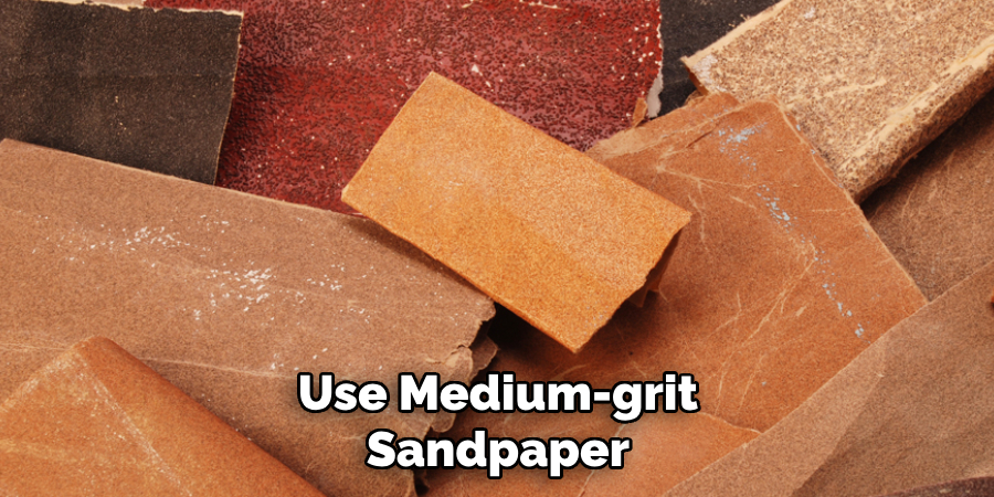 Use Medium-grit Sandpaper