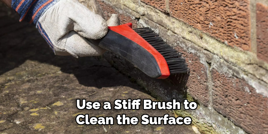  Use a Stiff Brush to Clean the Surface 