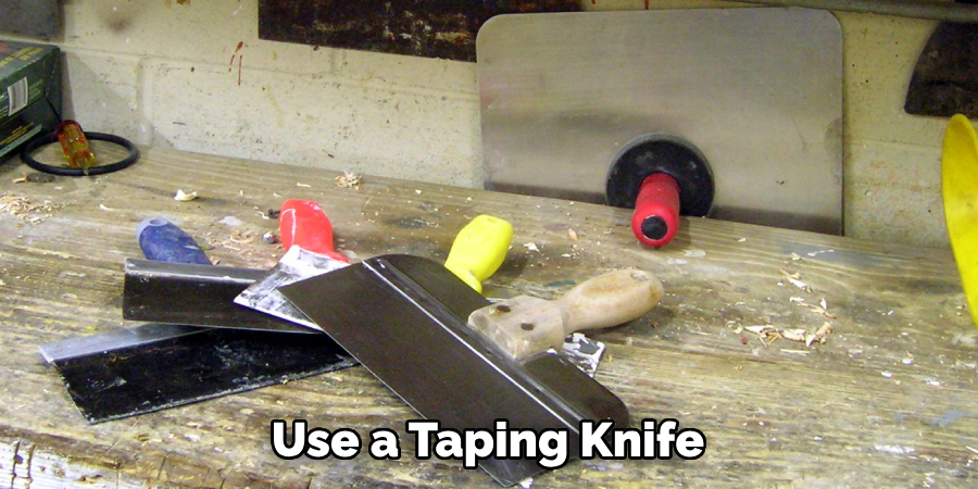 Use a Taping Knife 