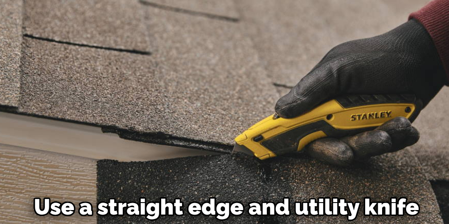 Use a straight edge and utility knife