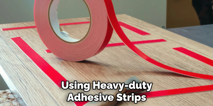 Using Heavy-duty Adhesive Strips