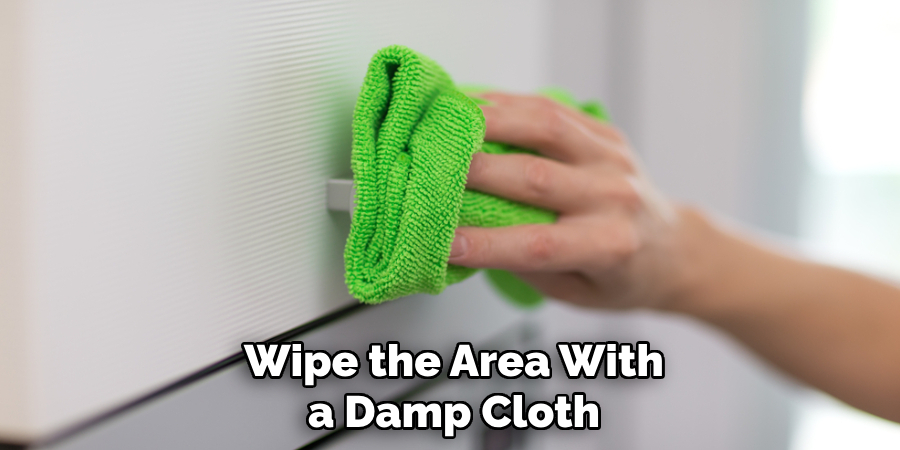 Wipe the Area With a Damp Cloth