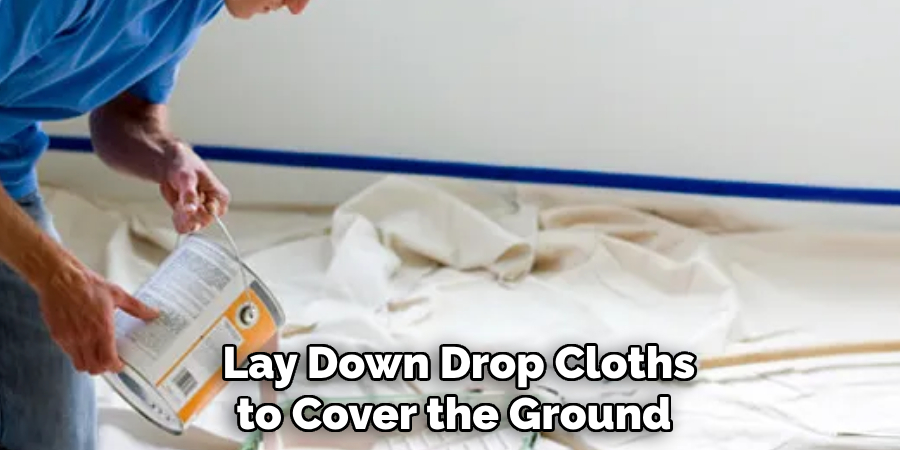  Lay Down Drop Cloths to Cover the Ground