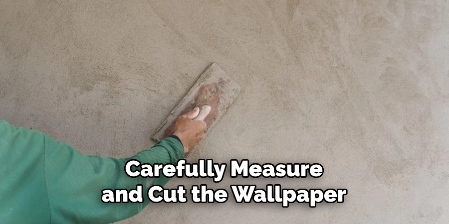 Carefully Measure and Cut the Wallpaper