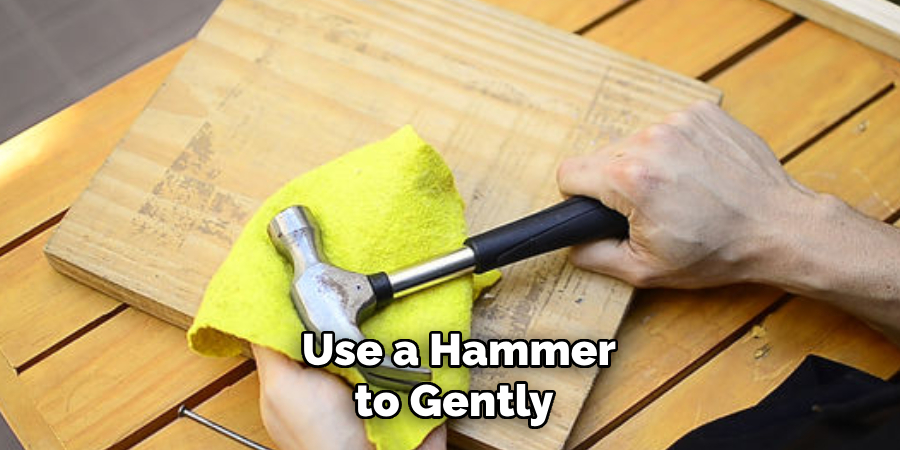 Use a Hammer to Gently