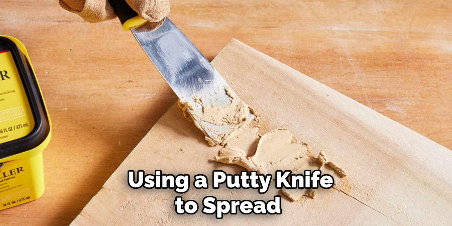Using a Putty Knife to Spread