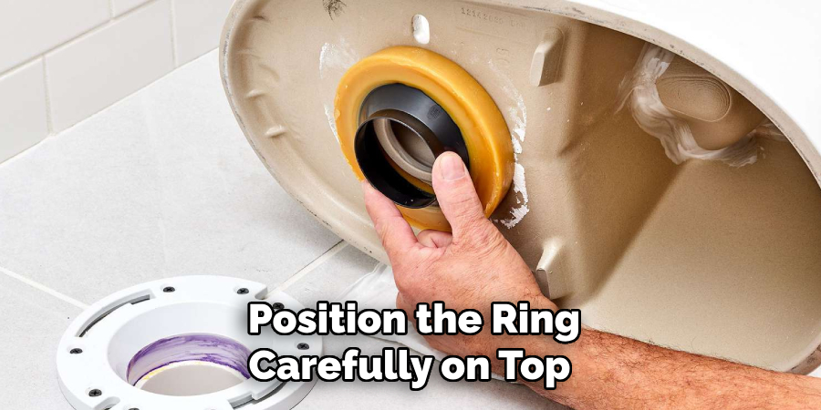 Position the Ring
Carefully on Top 