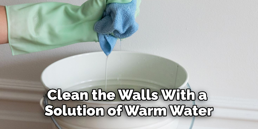 Clean the Walls With a Solution of Warm Water