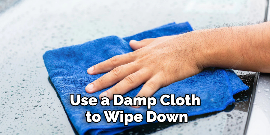use a damp cloth to wipe down