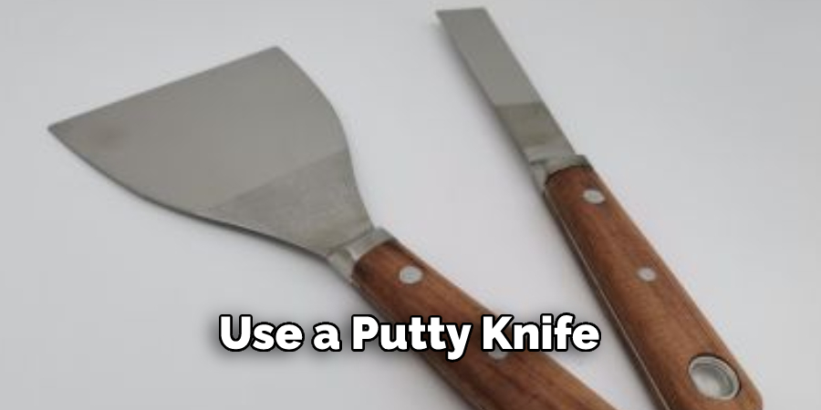 use a putty knife