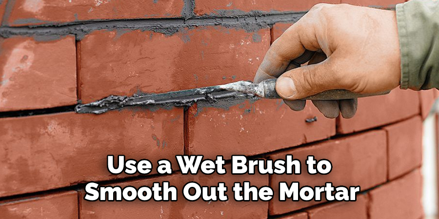 Use a Wet Brush to Smooth Out the Mortar