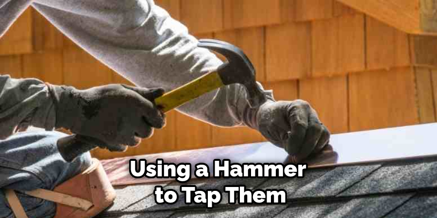 Using a Hammer to Tap Them