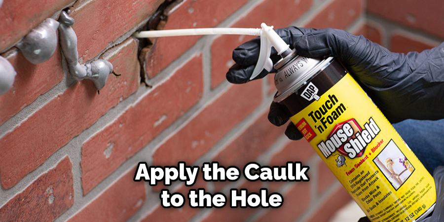 Apply the Caulk to the Hole