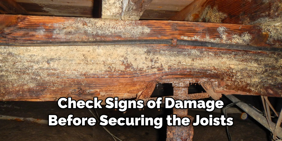 Check Signs of Damage
Before Securing the Joists