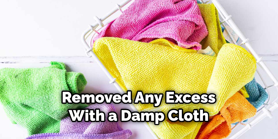 Removed Any Excess With a Damp Cloth