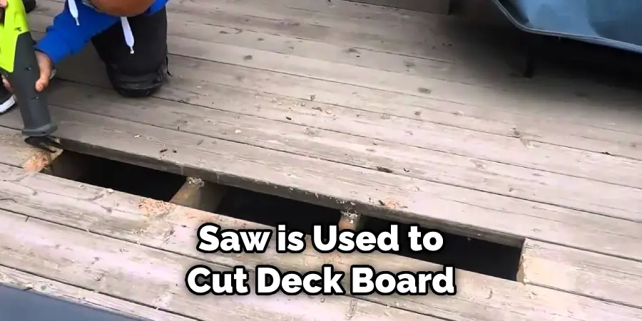 Saw is Used to Cut Deck Board