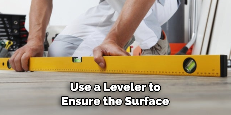 Use a Leveler to Ensure the Surface