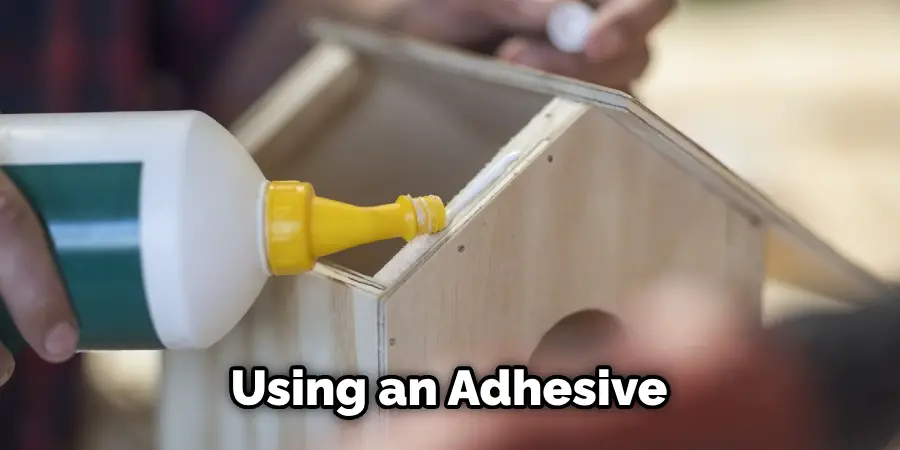 Using an Adhesive