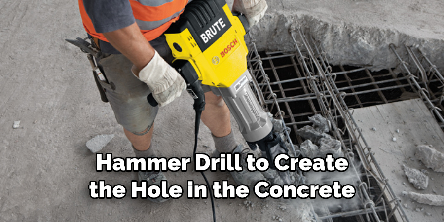 Hammer Drill to Create the Hole in the Concrete