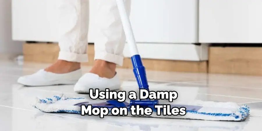 Using a Damp Mop on the Tiles